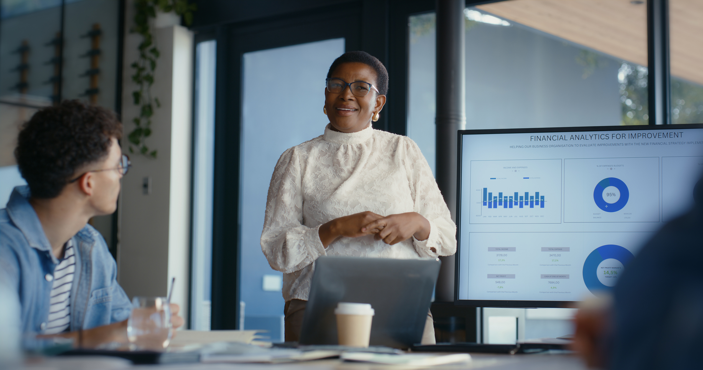 A women giving a powerpoint presentation.